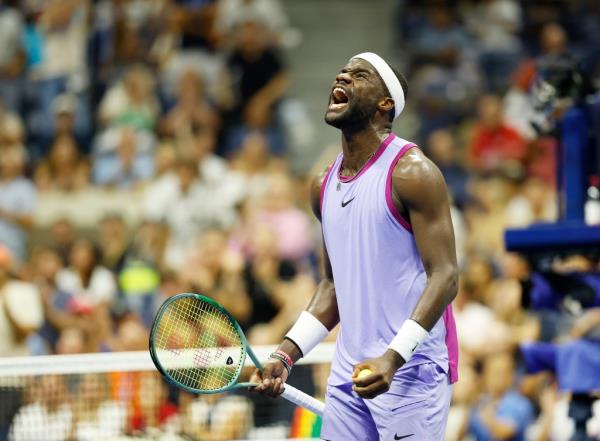 Frances Tiafoe (USA) [20] reacts as he plays against Alexei Popyrin (AUS) [28] during their match on Arthur Ashe Stadium. 